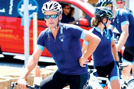 Lance Armstrong returns to Tour for cancer charity