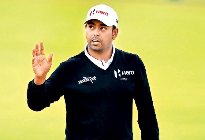 Anirban Lahiri reacts after making his birdie putt on the first green during third round on Day Four of the British Open yesterday. Pic/AFP