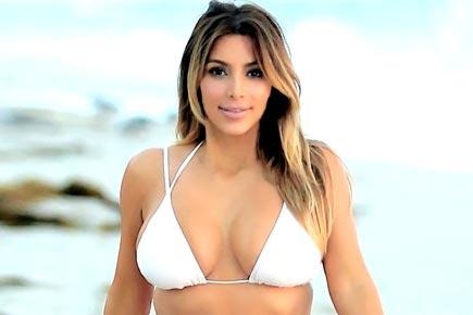 Kim Kardashian doesn't mind being rumoured faking pregnancy