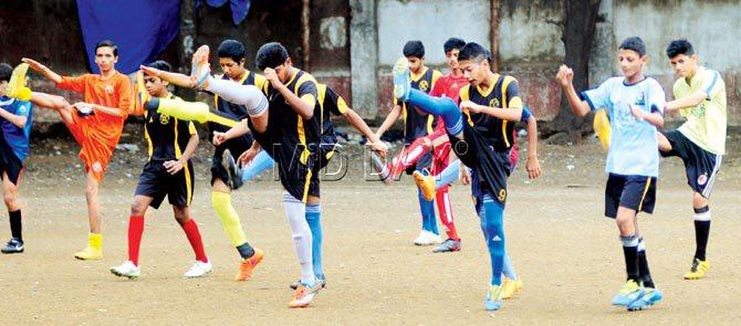 Champs at work: The St Lawrence High School’s (Kandivli) U-16 football team goes through the paces during a training session in Kandivli recently. Pic/Nimesh Dave 