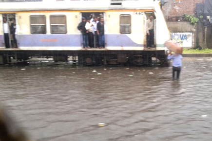 Heavy rains lash Mumbai, affect suburban train services