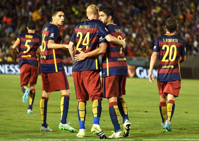 Luis Suárez (2nd R) of FC Barcelona celebrates with teammates after scoring against the Los Angeles Galaxy during their International Champions Cup game at the Rose Bowl Stadium in Pasadena, California. Pic/AFP