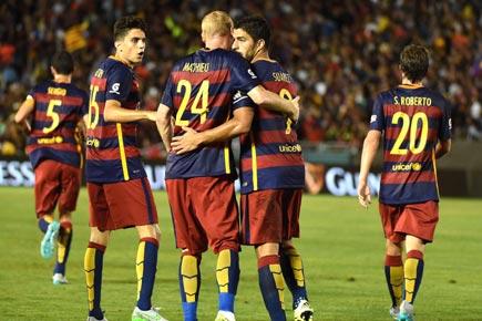 Suarez, Roberto lift Barcelona to 2-1 win over Galaxy