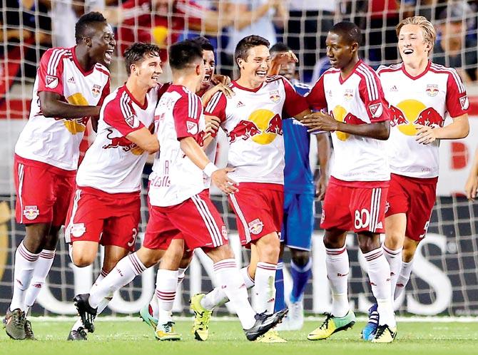 New York players celebrate a goal. Pic/AFP