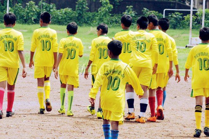 Neymars everywhere: SCD Barfiwala High School’s (Andheri) players sport the same jersey number on their backs as they walk on to the field to play Thakur Public School (Kandivli) in the Subroto Mujherjee DSO-inter-school under-14 football match at St Francis D’Assisi Ground in Borivali yesterday