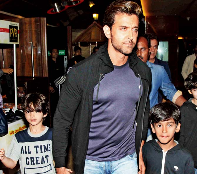 Hrithik Roshan was seen with his kids at a multiplex. Pic/ Yogen Shah