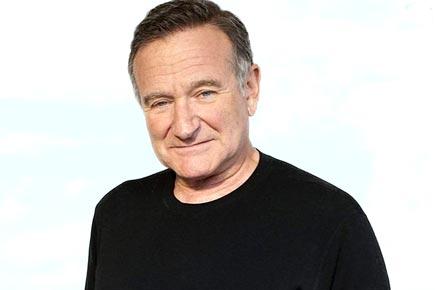 Robin Williams' son still grieving his death