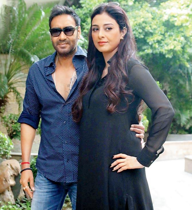Ajay Devgn (left) and Tabu at a promotional event in Delhi. pic/yogen shah