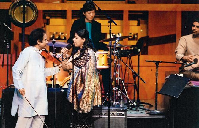 Violinist Dr L Subramaniam left performing with singer and wife Kavita Krishnamurthy at the Lincoln Centre, New York in 2004