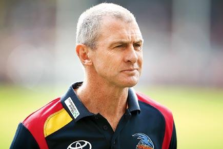 Son charged after AFL coach Phil Walsh stabbed to death