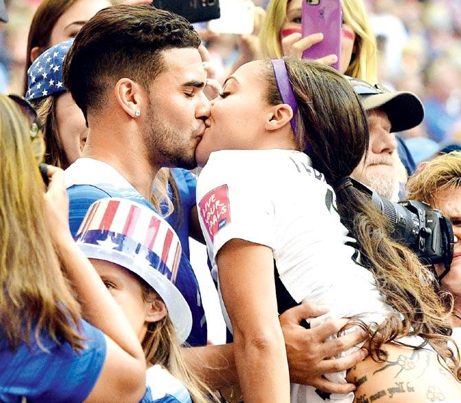 USA forward Sydney Leroux gets a kiss from husband Dom Dwyer after the final on Sunday. Pics/AFP