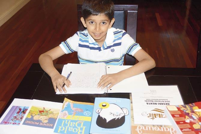 Akshaj Mehta at his favourite place in the world, his writing table