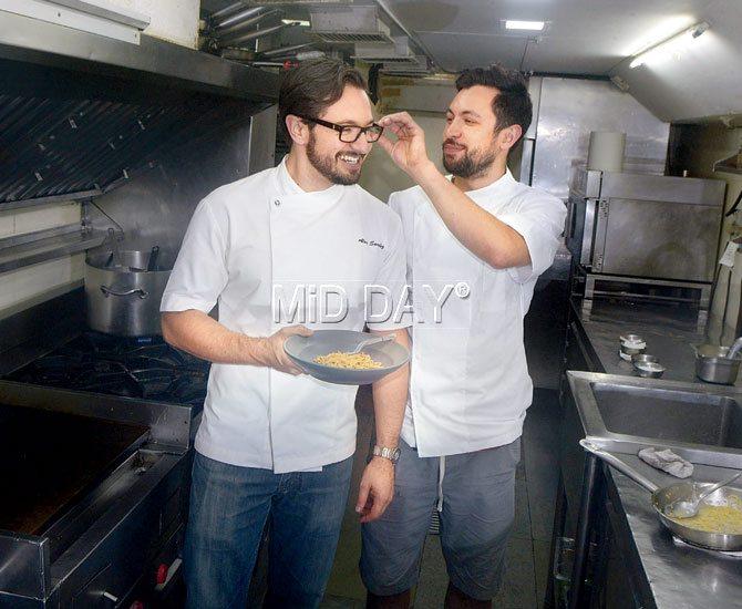 Alex Sanchez and Alex Leonard share a moment in the kitchen. pic/pradeep dhivar 