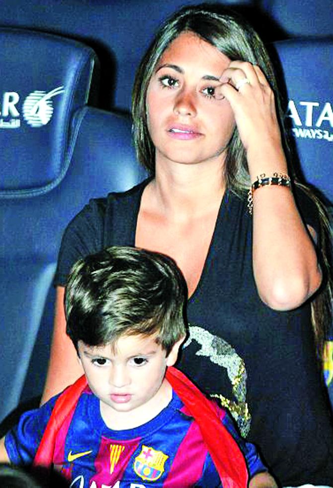 Argentina football captain Lionel Messi’s wife Antonella Rocuzzo with their two-year-old son Thiago. Pic/Getty Images