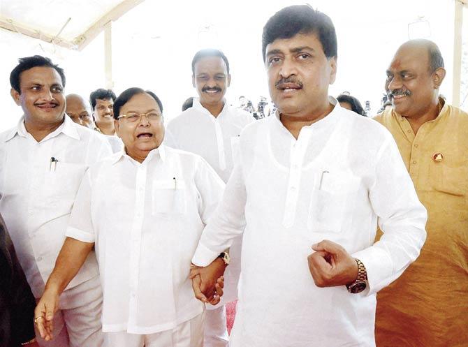 State Congress chief Ashok Chavan along with other party leaders at Vidhan Bhavan yesterday. Pic/PTI