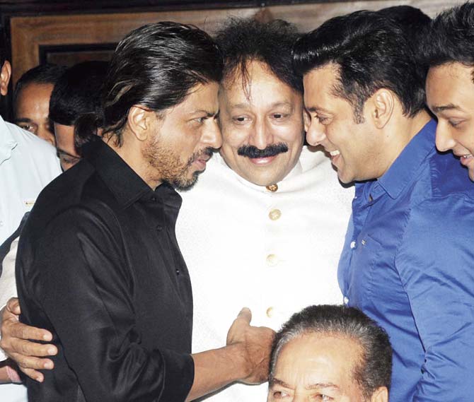 Baba Siddique with Shah Rukh Khan and Salman Khan. File pic