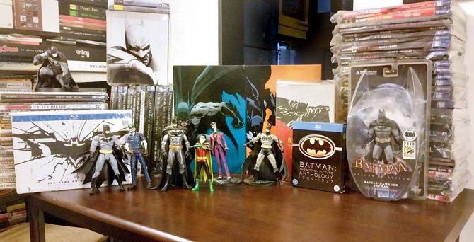 Mihir Joshi’s extensive Batman collection includes comic books, statues, action figures and Blu-ray DVDs of all the movies
