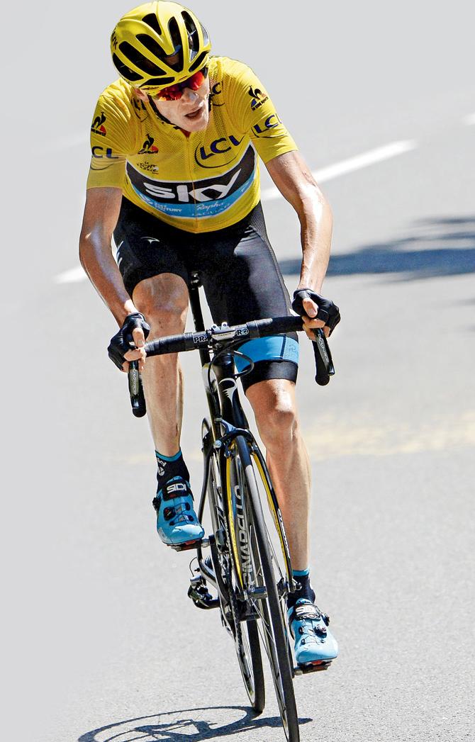 Great Britain’s Chris Froome of Team Sky wearing the overall leader’s yellow jersey, rides in the hills during Stage 10 of the Tour de France cycling race near Tarbes, southwestern France recently.