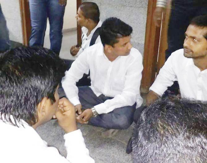 Students staged a sit-in protest at the college campus yesterday, after which the police intervened and recorded statements from them and the principal
