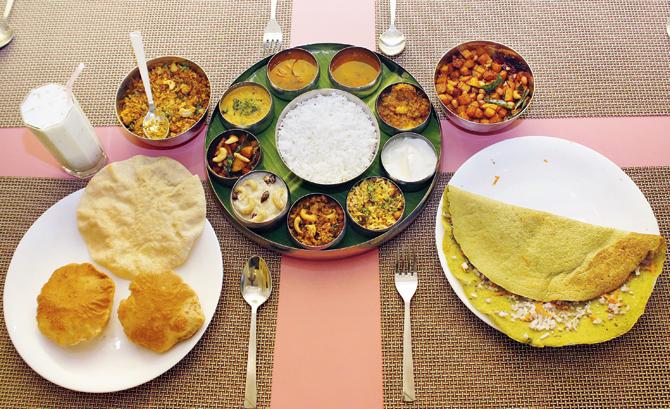 Our meal included (from left) buttermilk, Gonguura Special Thali and Pesarattu