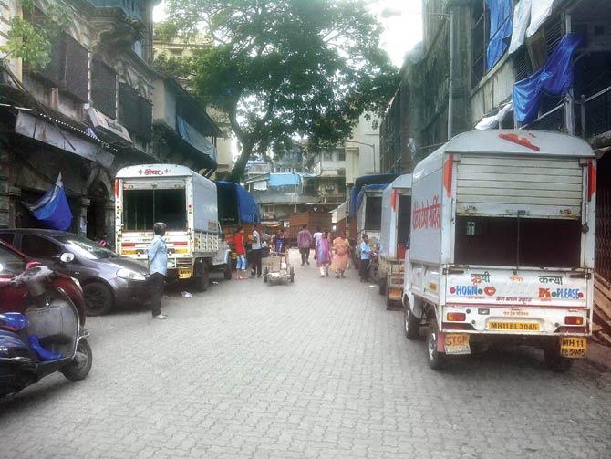 One side of the street is meant for parking for locals, but trucks are always parked there. Even handcarts are kept there
