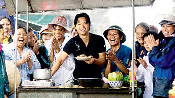 Luke Nguyen whipping up Vietnamese street food