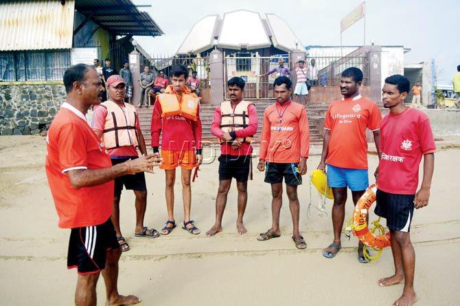 Lifeguard Manohar Shetty and his team man the dangerous stretch at Juhu Beach