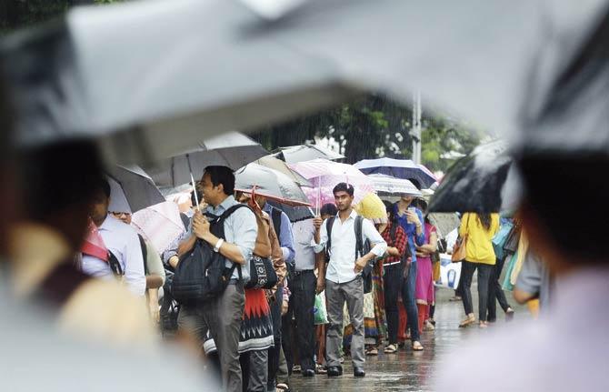 The rains making a comeback in Mumbai were a positive for the markets. Pic/PTI