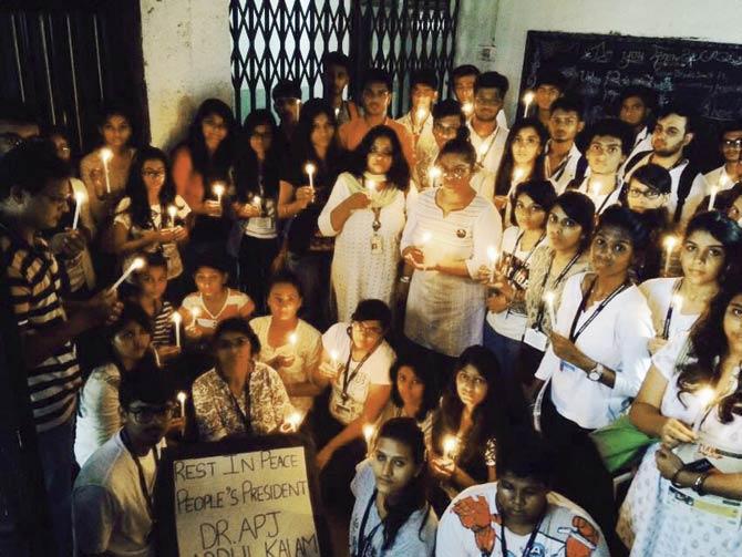 Students of the mass media programme at Nagindas Khandwala College in Malad hold a candlelight vigil in his memory