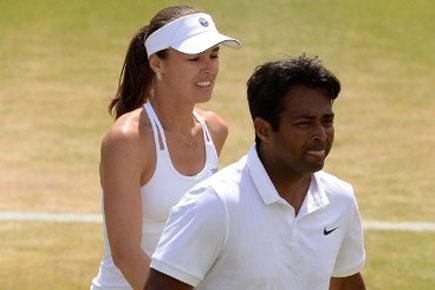 Wimbledon: Paes-Hingis enter mixed doubles semi-finals, Sania-Bruno crash out