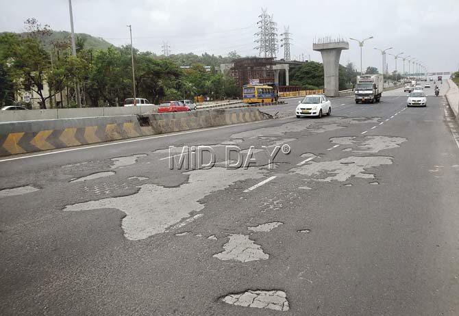 The asphalt is already wearing off on the highway, pointing  to the shoddy  work done in the Rs 1,220-crore road widening and concretisation project. Motorists are also unhappy about the shoddy patchwork repairs being conducted on the highway currently. Pics/Suresh KK
