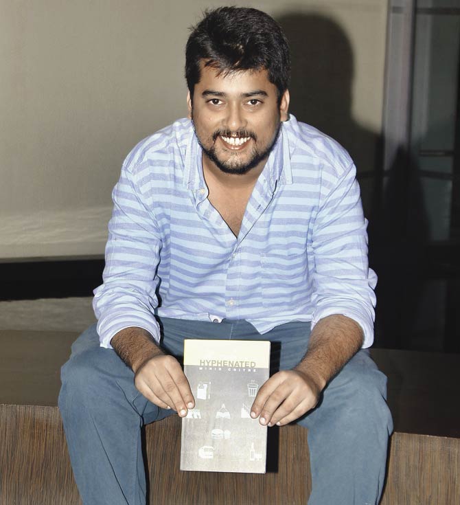 Poet Mihir Chitre poses with his book of poems Hyphenated that was published by the Sahitya Akademi. Pic/Tushar Satam