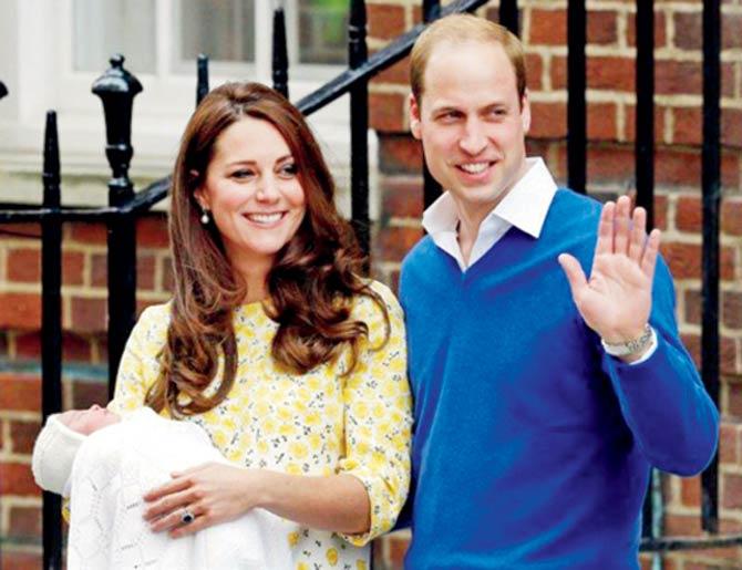 Prince William and Kate with princess, Charlotte, wave out to the media. Pic/AFP