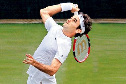 Wimbledon: Roger Federer creates record in quarter-final win