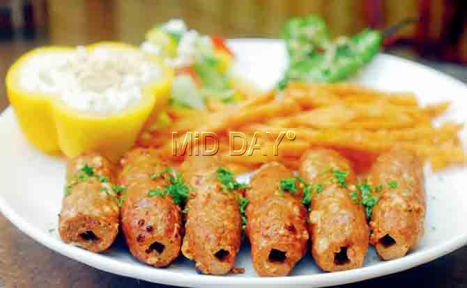 Serbian Cevapcici featured minced lamb and chicken kebabs