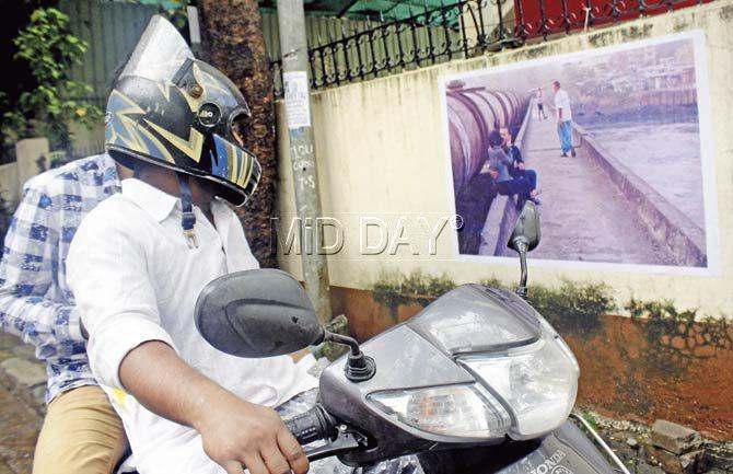The helmet cannot stop heads from turning at the sight of this picture at Turner Road, head turner, literally