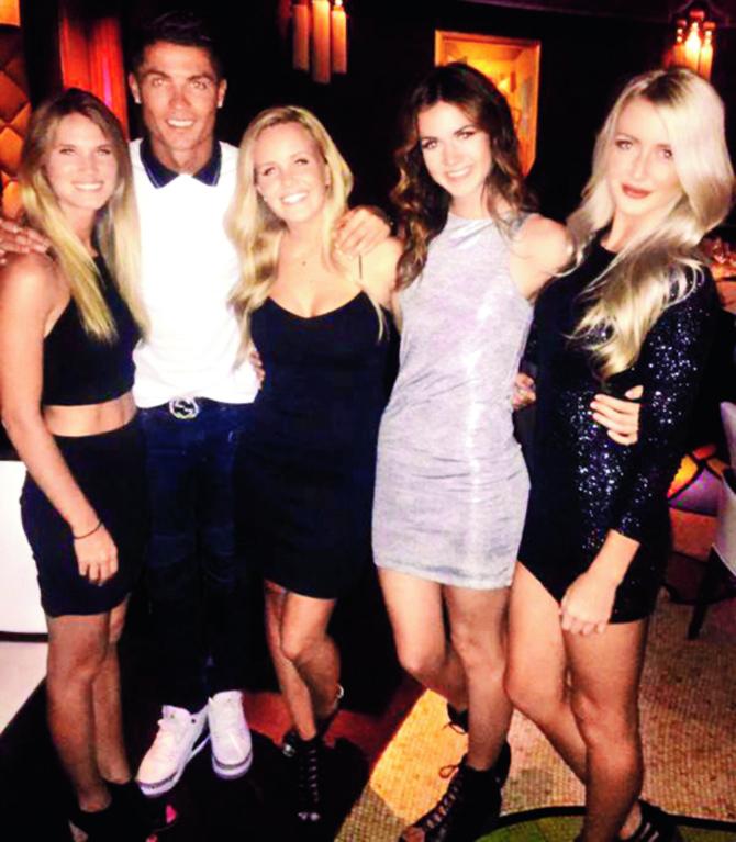 The girls seem to be having a whale of a time with Ronaldo as he treated them to dinner in Las Vegas 