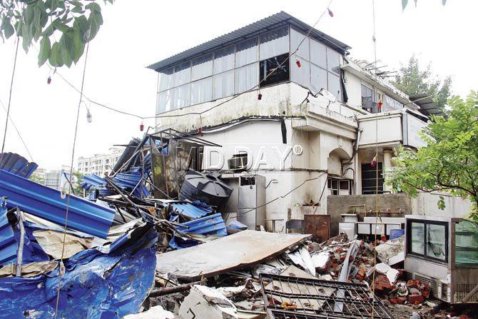 A portion of White House bar in Mira Road (East) was demolished yesterday. Pic/Sharad Vegda