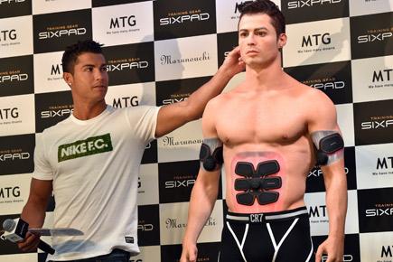 Cristiano Ronaldo meets near-nude clone in Tokyo