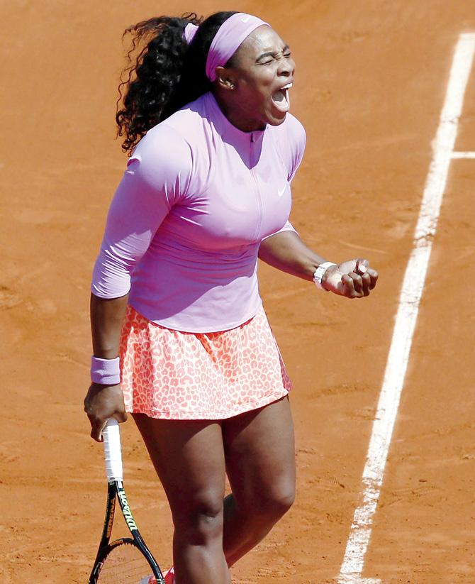 Serena Williams exults after winning a point against compatriot Sloane Stephens during the French Open fourth round yesterday