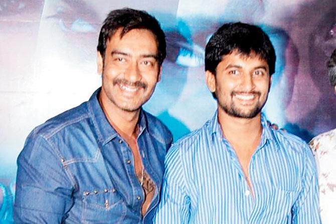 Ajay Devgn (left) with South actor Nani who starred in Telugu film, Eega. Its HIndi version was dubbed by the Bolly actor-producer