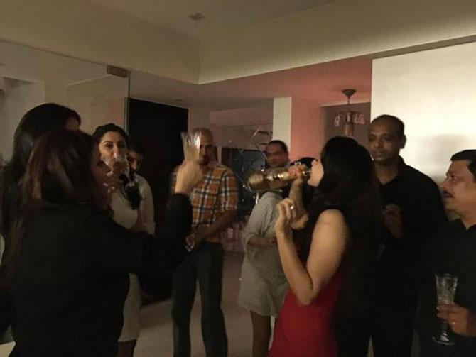Kuunal captioned this picture, "Ameesha having her fav crystal champagne with friends and Azhar Bahi @ameesha_patel". Pic/Kuunal Goomer