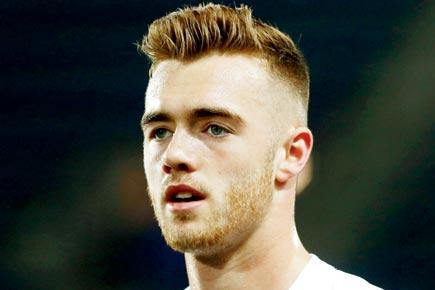 Arsenal charged over Calum Chambers deal