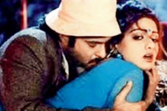 Anil Kapoor (left) and Sridevi in the Kaate Nahin Kat Te song from Mr India (1987). Sridevi stunned in a wet blue saree and the song became a trendsetter for erotic numbers