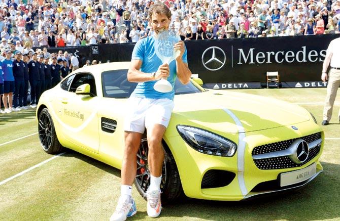 Rafael Nadal poses on the winner
