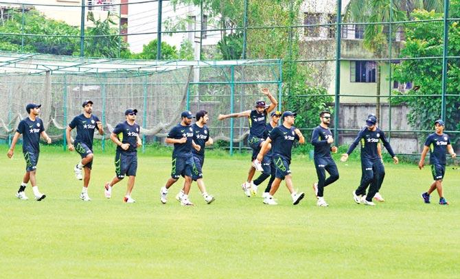 Indian players warm up before the practice session at Sher-e-Bangla National Cricket Stadium in Mirpur yesterday. Pic/AFP