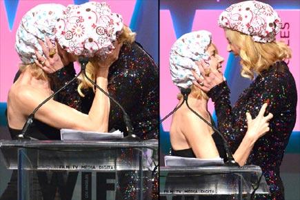 Nicole Kidman and Naomi Watts lock lips onstage