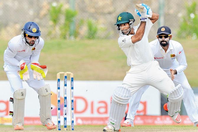 Pakistan’s Asad Shafiq en route his 131 against Sri Lanka on Saturday. PIC/AFP
