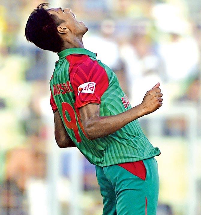 Mustafizur Rahman celebrates the wicket of India skipper MS Dhoni in Mirpur on Sunday. Pic/AFP