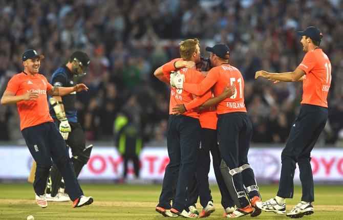England celebrate winning by 56 runs after Jonny Bairstow caught out New Zealand